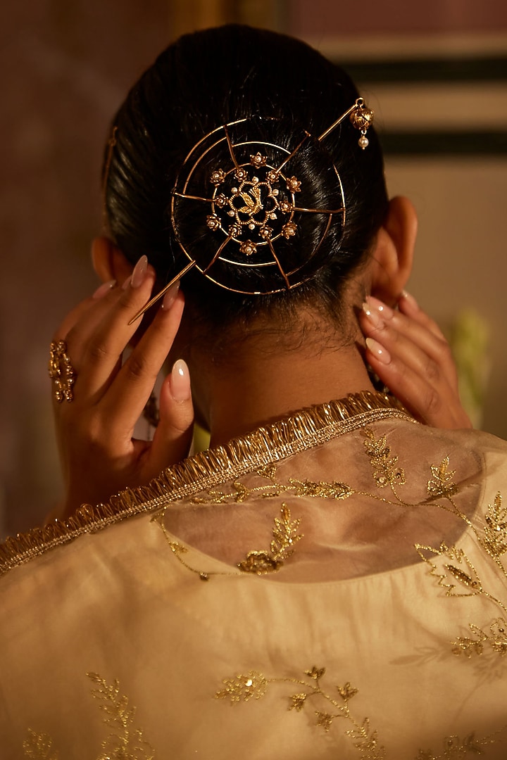 Antique Gold Finish Lotus Flower & Flying Bird Bun Accessory by PARISHRI at Pernia's Pop Up Shop