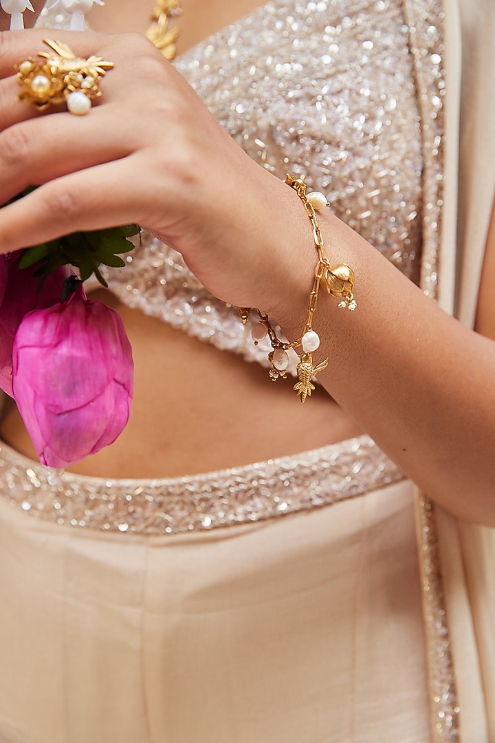 Antique Gold Finish Charm Bracelet by PARISHRI at Pernia's Pop Up Shop