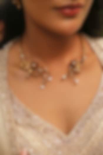 Antique Gold Finish Flora & Fauna Motif Hasli Necklace by PARISHRI at Pernia's Pop Up Shop