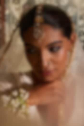 Antique Gold Finish Floral Maang Tikka by PARISHRI at Pernia's Pop Up Shop