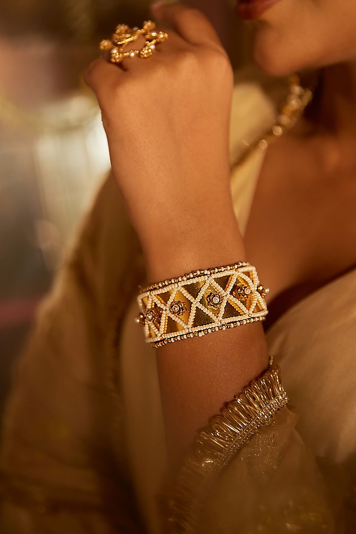 Antique Gold Finish Pearl Handcuff by PARISHRI at Pernia's Pop Up Shop