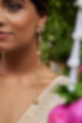 Antique Gold Finish Lotus Motifs & Pearl Embellished Dangler Earrings by PARISHRI at Pernia's Pop Up Shop