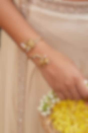 Antique Gold Finish Lotus & Pearl Bracelet by PARISHRI at Pernia's Pop Up Shop