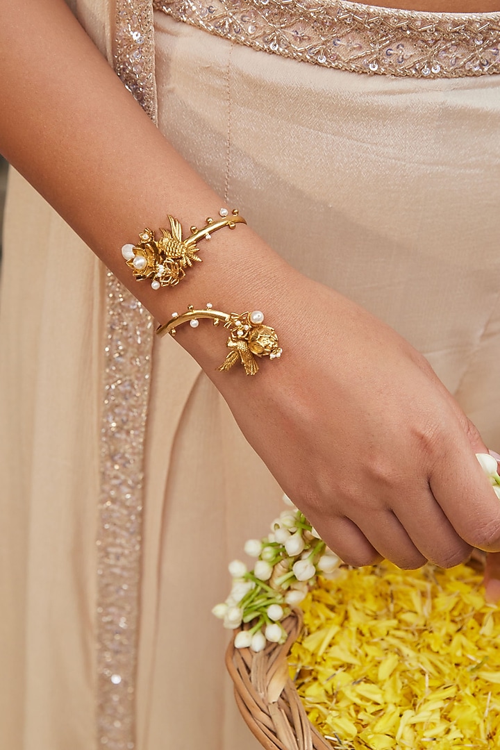 Antique Gold Finish Lotus & Pearl Bracelet by PARISHRI at Pernia's Pop Up Shop