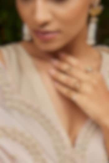 Antique Gold Finish Stackable Floral Ring (Set Of 4) by PARISHRI at Pernia's Pop Up Shop