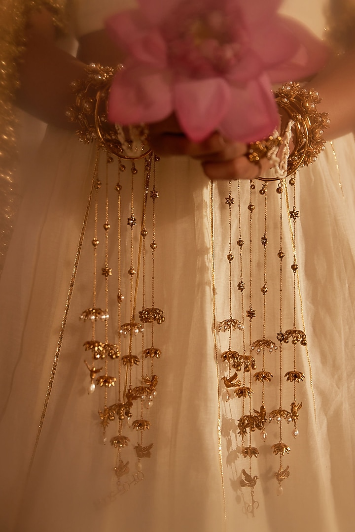 Antique Gold Plated Flying Bird & Pearl Kaleeras (Set Of 2 ) by PARISHRI at Pernia's Pop Up Shop