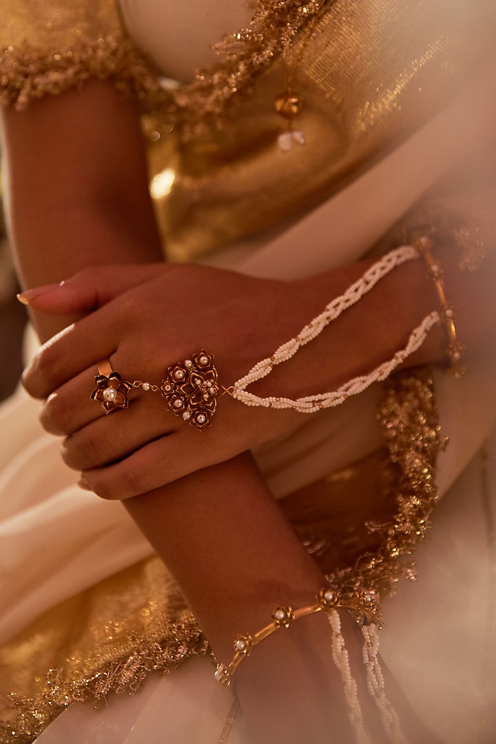 Antique Gold Finish Lotus Hathphool (Set Of 2) by PARISHRI at Pernia's Pop Up Shop