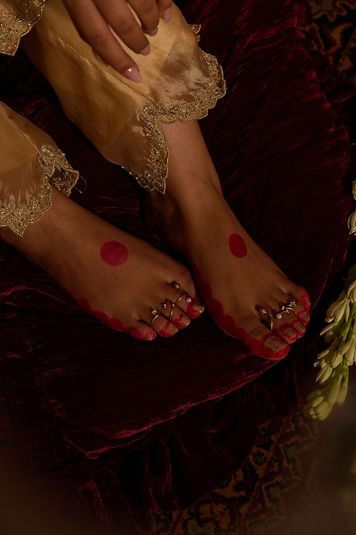 Antique Gold Finish Lotus Bud & Pearl Toe Rings (Set Of 6) by PARISHRI at Pernia's Pop Up Shop