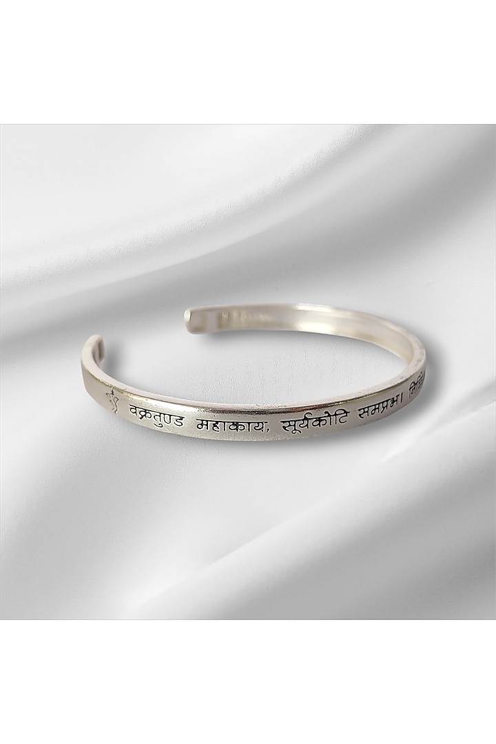 Silver Vakratunda Mahakaya Kada In Sterling Silver by PARISHRI at Pernia's Pop Up Shop