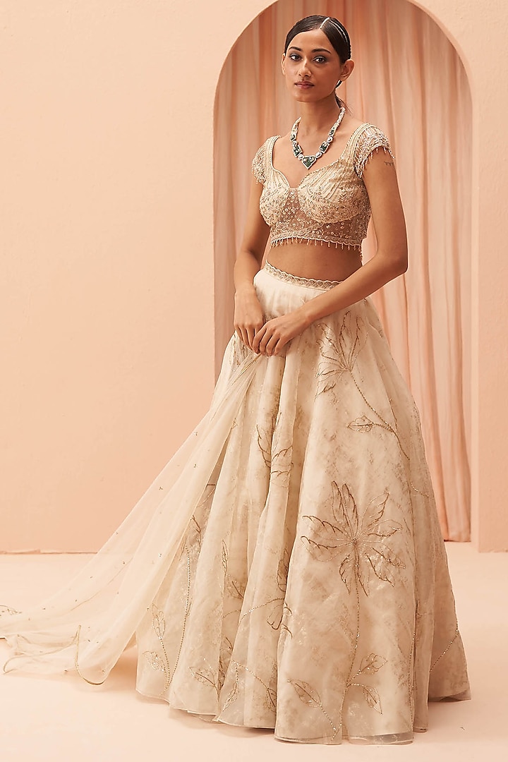 Off-White Gold Hand Embroidered Wedding Lehenga Set by Parul Gandhi at Pernia's Pop Up Shop