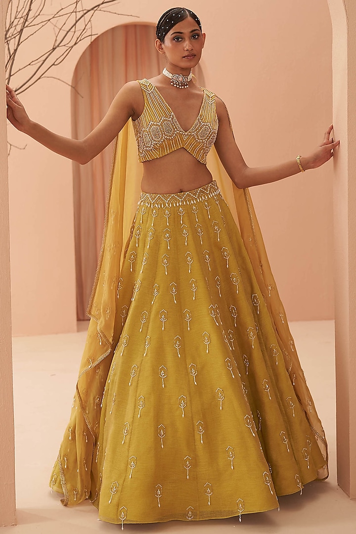 Yellow Hand Embroidered Lehenga Set by Parul Gandhi