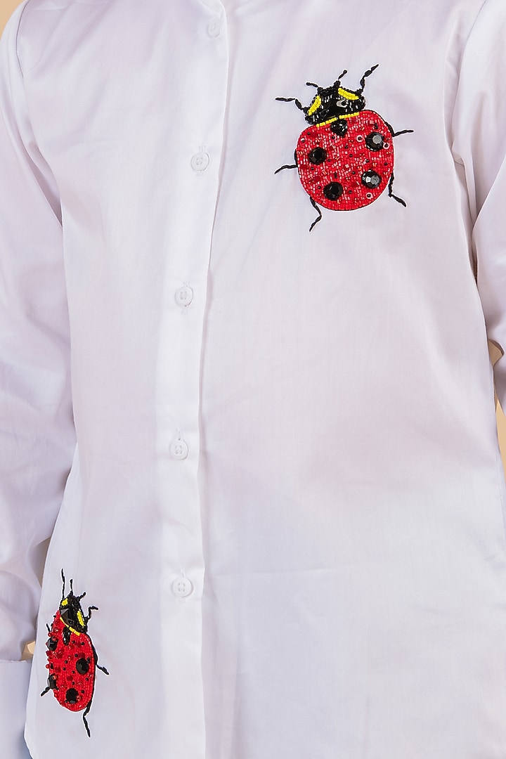 White Cotton Satin Embroidered Shirt For Girls by Partykles at Pernia's Pop Up Shop