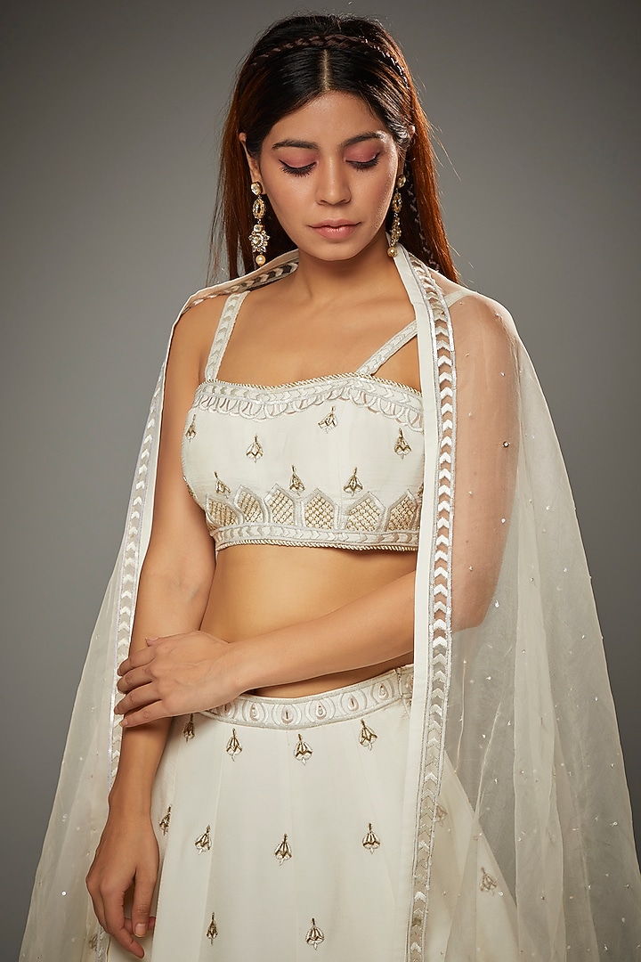 Ivory Silk Hand Embroidered Wedding Lehenga Set by Parul | Vivek at Pernia's Pop Up Shop