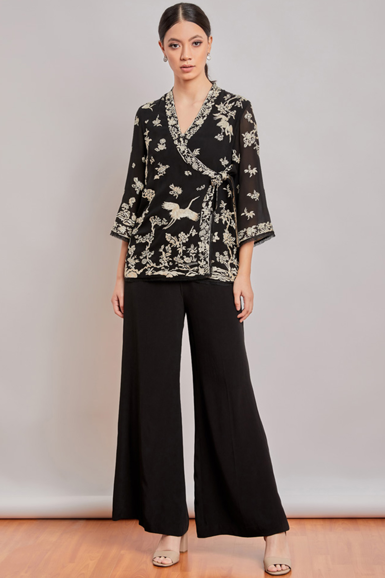 Black Embroidered Wrap Top by Patine at Pernia's Pop Up Shop