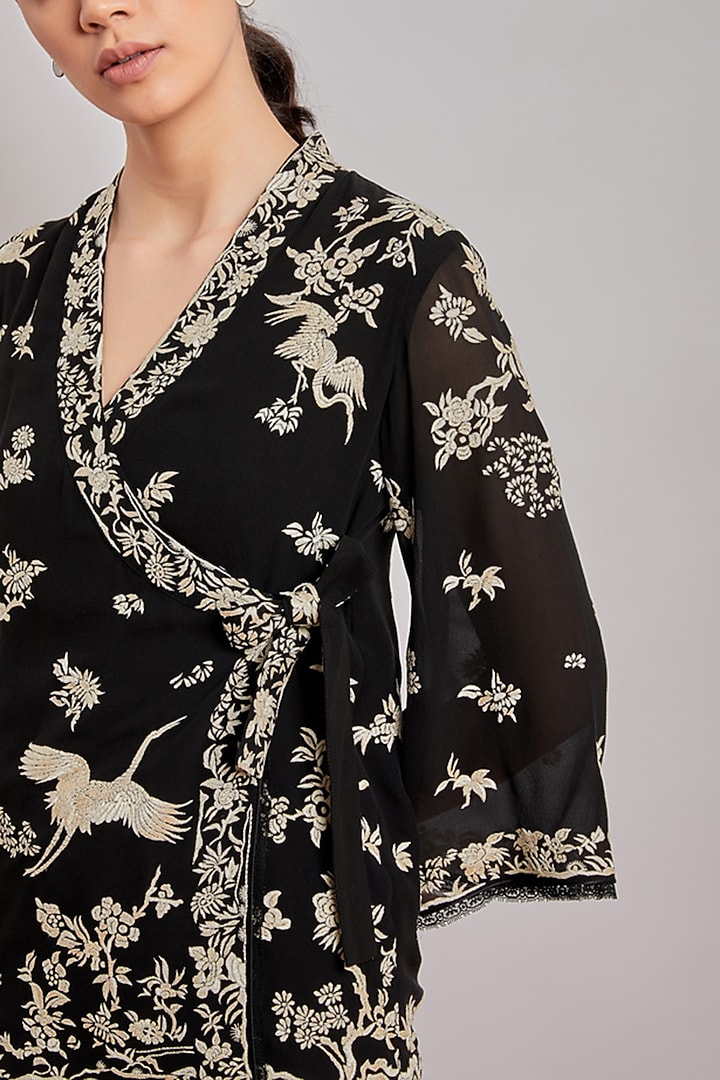 Black Embroidered Wrap Top by Patine at Pernia's Pop Up Shop