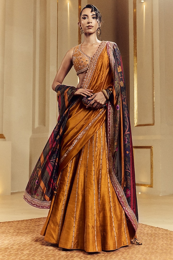Mustard Raw Silk Mirror Work Wedding Lehenga Set by Punit Balana at Pernia's Pop Up Shop