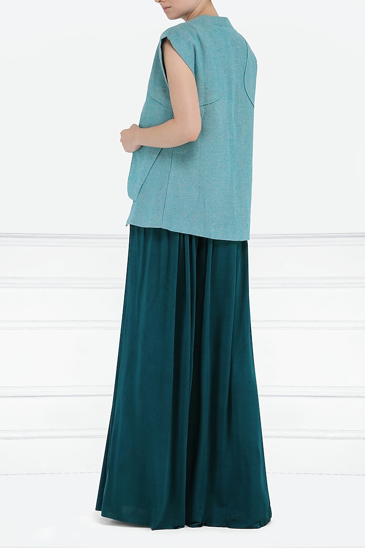 Turquoise sleeveless jacket available only at Pernia's Pop Up Shop.