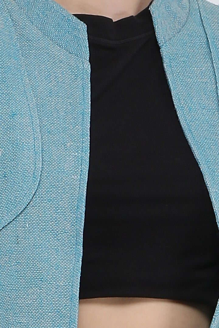 Turquoise sleeveless jacket available only at Pernia's Pop Up Shop.