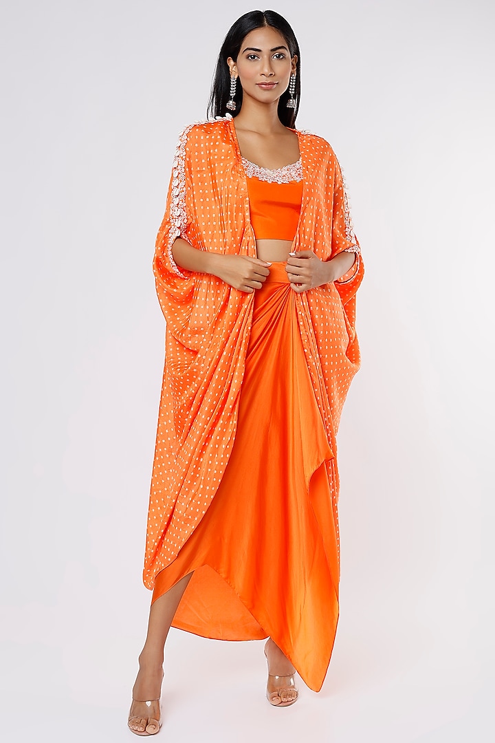 Orange Silk Draped Skirt Set With Bandhej Cape by Pink City By Sarika