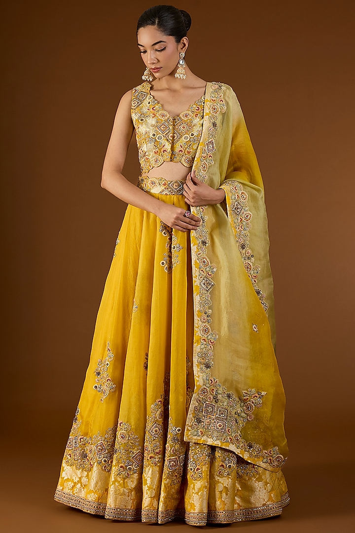 Yellow Shimmer Brocade Organza Bridal Lehenga Set by Petticoat Lane at Pernia's Pop Up Shop