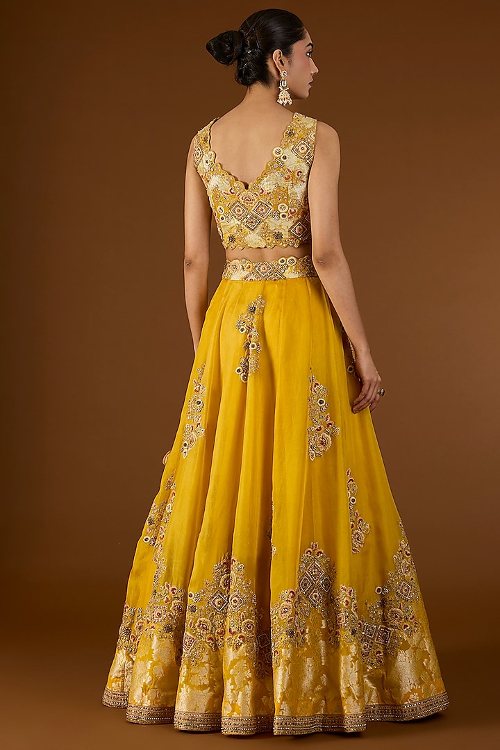 Yellow Shimmer Brocade Organza Bridal Lehenga Set by Petticoat Lane at Pernia's Pop Up Shop