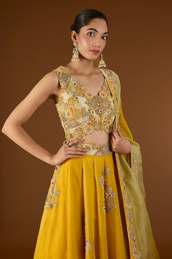 Yellow Shimmer Brocade Organza Bridal Lehenga Set by Petticoat Lane at Pernia's Pop Up Shop