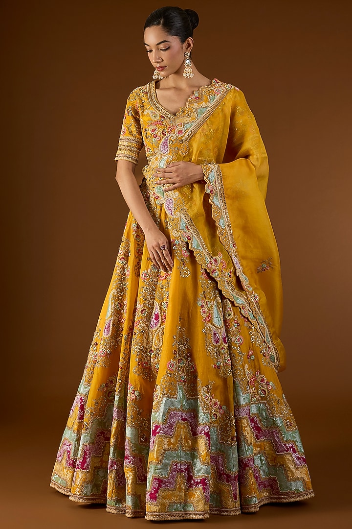 Mustard Brocade & Organza Hand & Machine Embroidered Kali Bridal Lehenga Set by Petticoat Lane at Pernia's Pop Up Shop