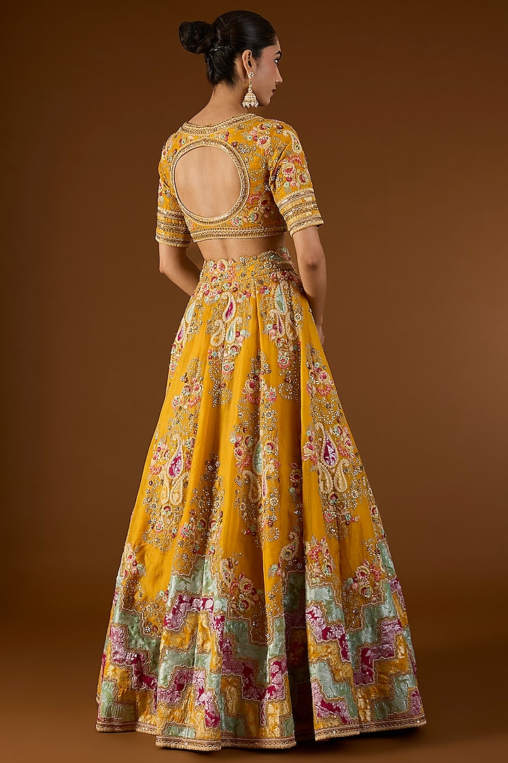 Mustard Brocade & Organza Hand & Machine Embroidered Kali Bridal Lehenga Set by Petticoat Lane at Pernia's Pop Up Shop
