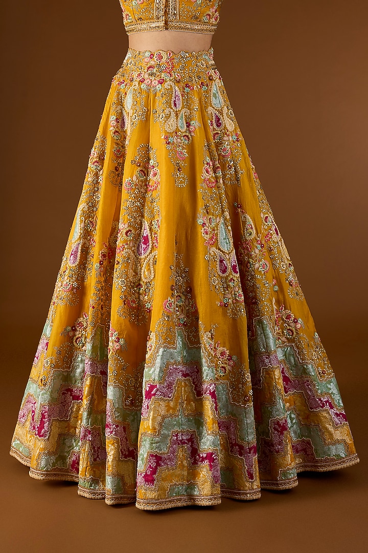 Mustard Brocade & Organza Hand & Machine Embroidered Kali Bridal Lehenga Set by Petticoat Lane at Pernia's Pop Up Shop