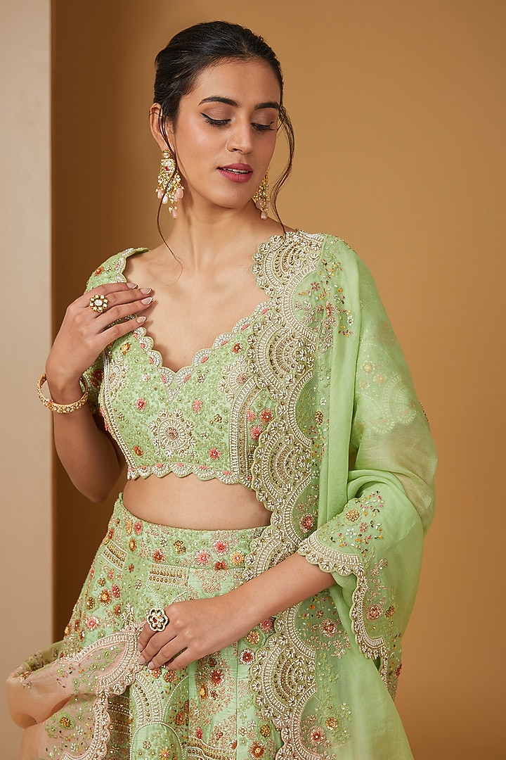 Green Dupion Dori Embroidered Shimmer Bridal Lehenga Set by Petticoat Lane at Pernia's Pop Up Shop