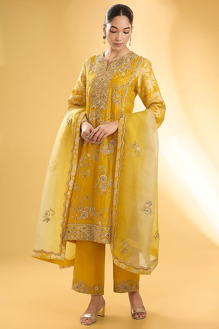 Yellow Shimmer Brocade Hand & Machine Embroidered A-Line Kurta Set by Petticoat Lane at Pernia's Pop Up Shop