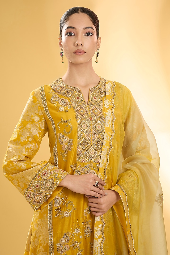 Yellow Shimmer Brocade Hand & Machine Embroidered A-Line Kurta Set by Petticoat Lane at Pernia's Pop Up Shop