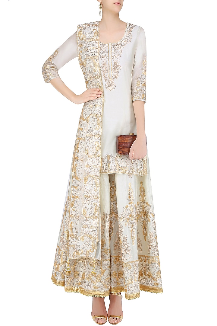 Ivory and gold gota patti embroidered kurta and sharara pants set available only at Pernia's Pop Up Shop.