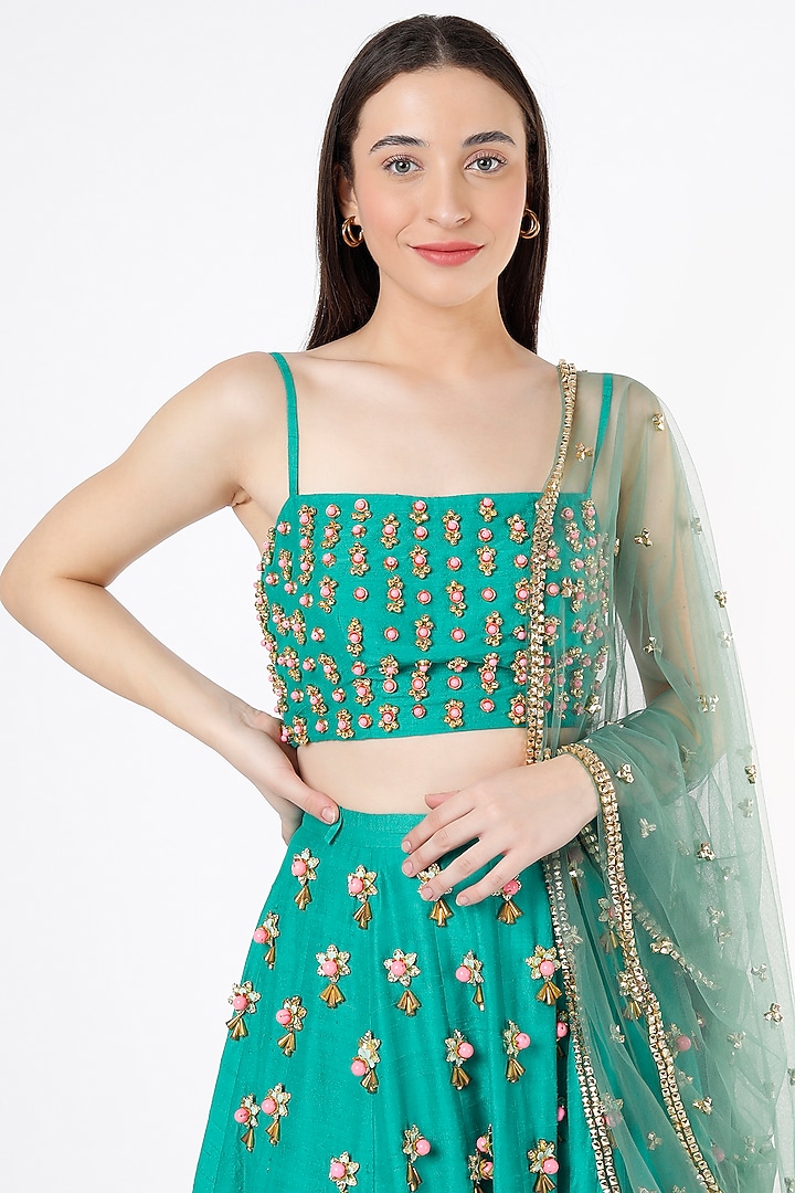 Dark Green Raw Silk Embellished Bridal Lehenga Set by Papa Don't Preach by Shubhika at Pernia's Pop Up Shop