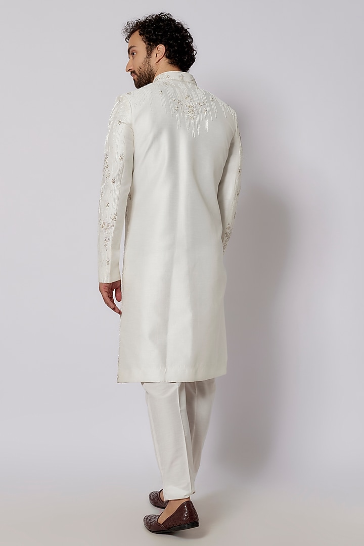 Ivory Raw Silk Hand Embroidered Wedding Sherwani Set by PARV DESIGN STUDIO at Pernia's Pop Up Shop