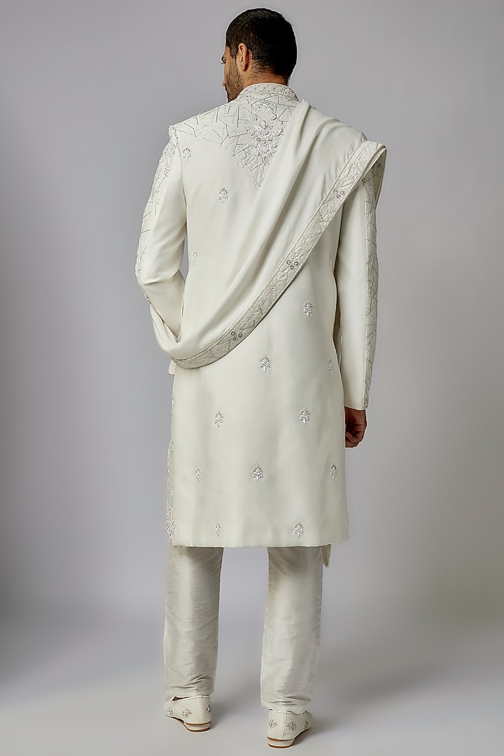 Off-White Raw Silk Embroidered Groom Sherwani Set by PARV DESIGN STUDIO at Pernia's Pop Up Shop