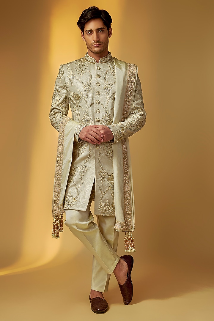 Green Gold Shimmer Tissue Zardosi Hand Embroidered Groom Sherwani Set by PARV DESIGN STUDIO at Pernia's Pop Up Shop
