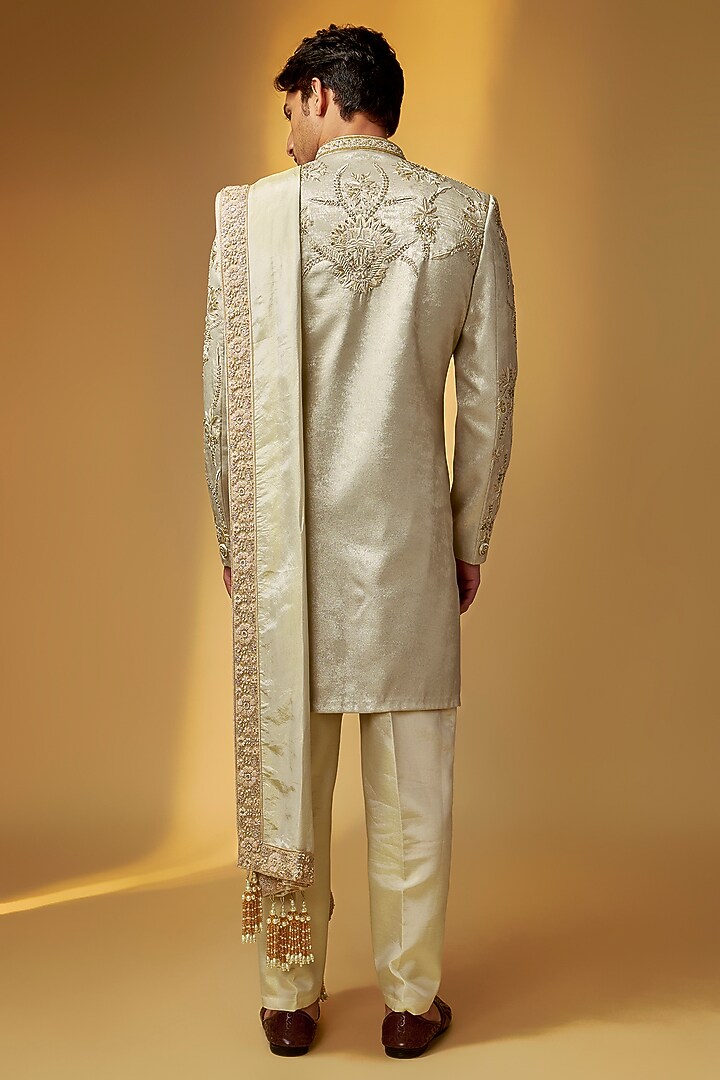 Green Gold Shimmer Tissue Zardosi Hand Embroidered Groom Sherwani Set by PARV DESIGN STUDIO at Pernia's Pop Up Shop