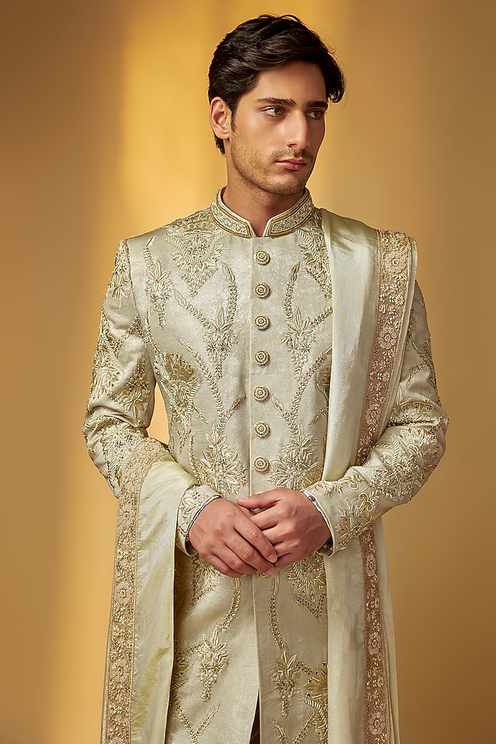 Green Gold Shimmer Tissue Zardosi Hand Embroidered Groom Sherwani Set by PARV DESIGN STUDIO at Pernia's Pop Up Shop