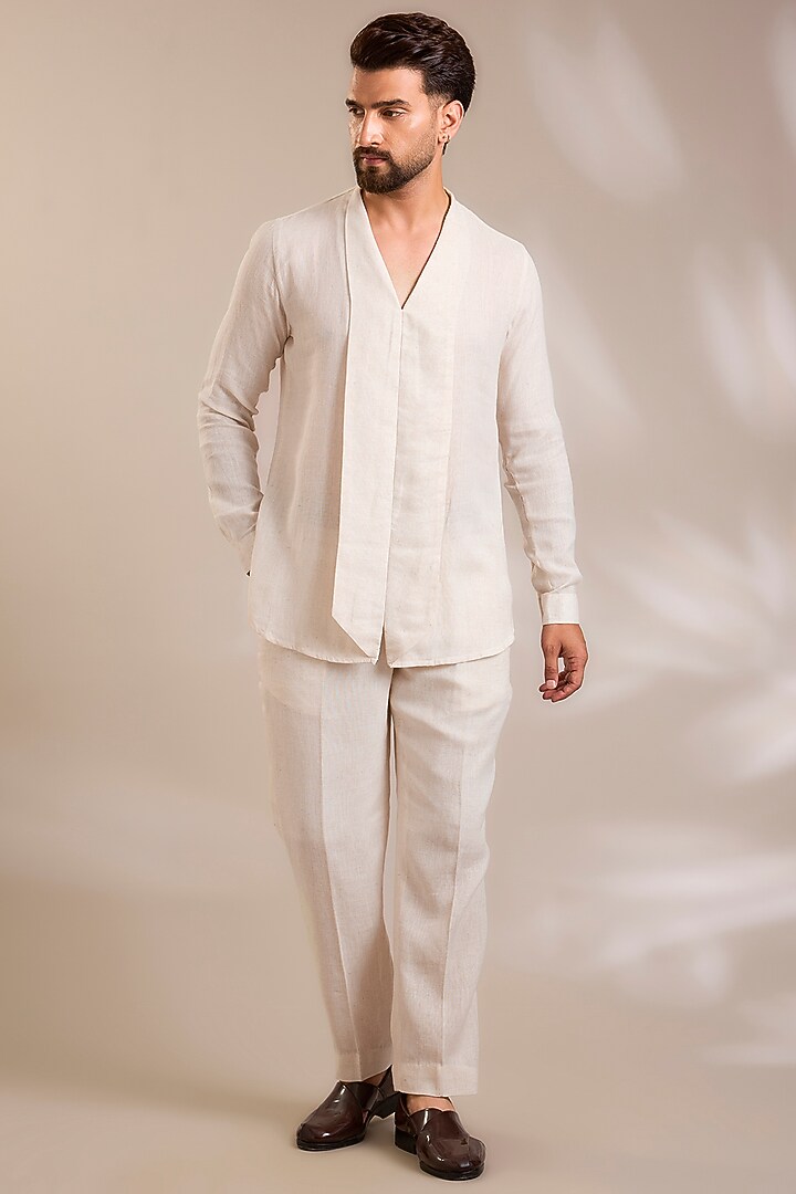 Beige Net Cutwork Embroidered Jacket Set by PARV DESIGN STUDIO at Pernia's Pop Up Shop