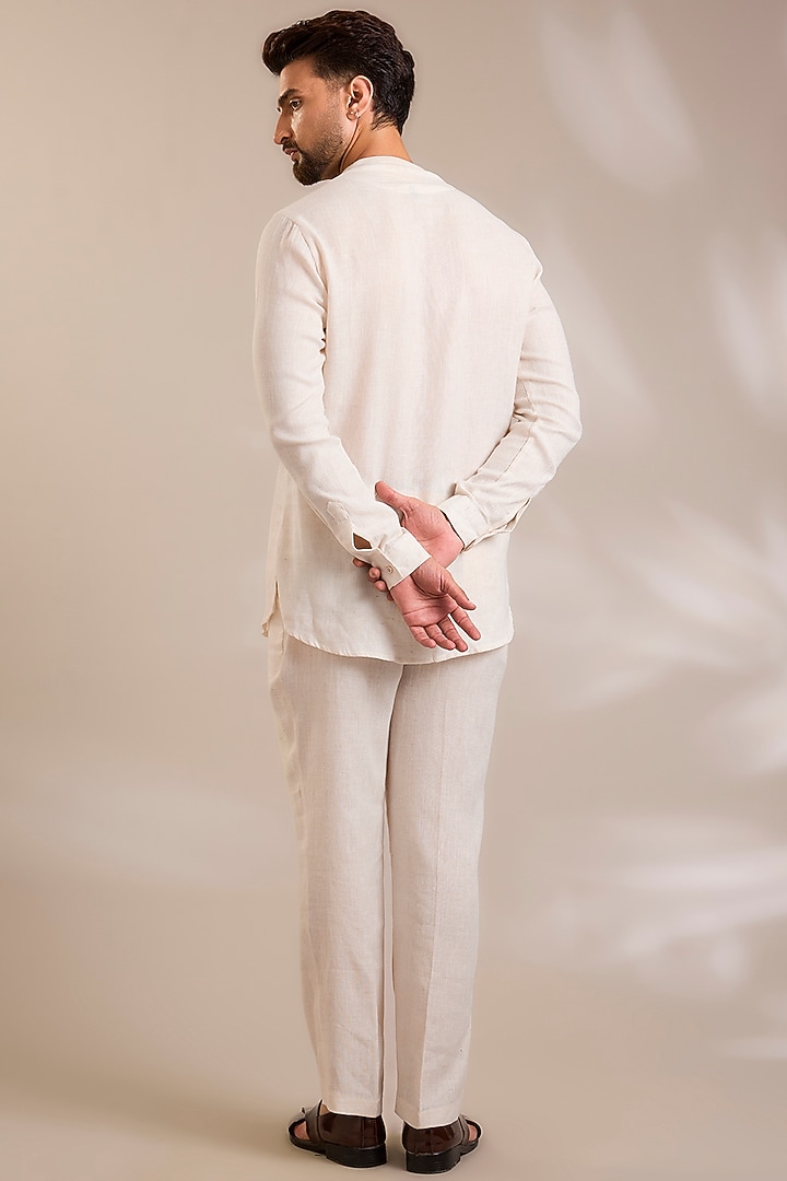 Beige Net Cutwork Embroidered Jacket Set by PARV DESIGN STUDIO at Pernia's Pop Up Shop