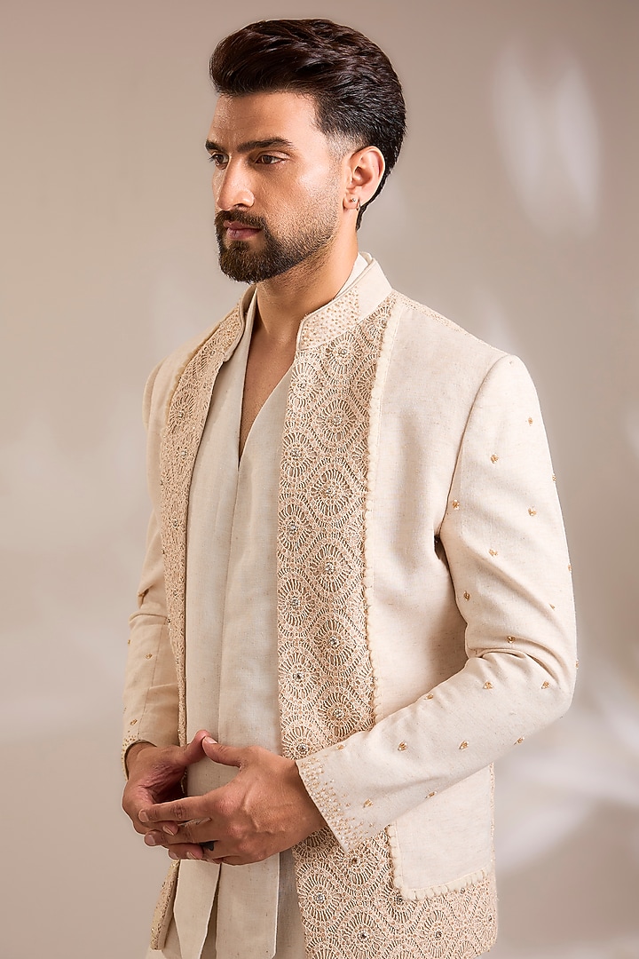 Beige Net Cutwork Embroidered Jacket Set by PARV DESIGN STUDIO at Pernia's Pop Up Shop