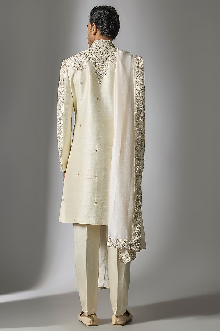 Off-White Raw Silk Zari & Zardosi Embroidered Groom Sherwani Set by PARV DESIGN STUDIO at Pernia's Pop Up Shop