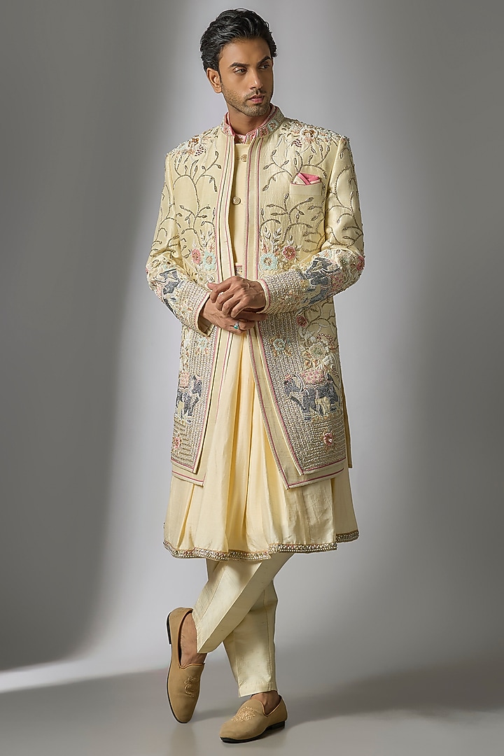 Gold Raw Silk Resham & Cutdana Embroidered Sherwani Set by PARV DESIGN STUDIO