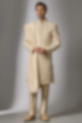 Gold Mulberry Silk Resham Embroidered Sherwani Set by PARV DESIGN STUDIO