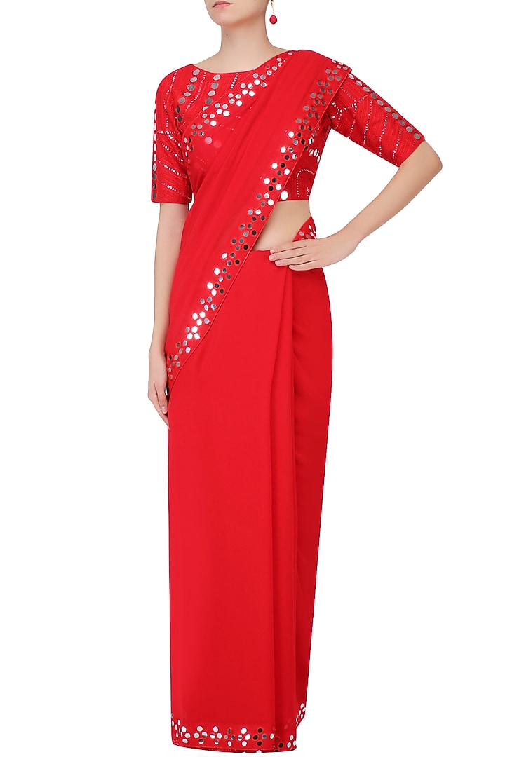 Red mirror work embellished saree with blouse available only at Pernia's Pop Up Shop.