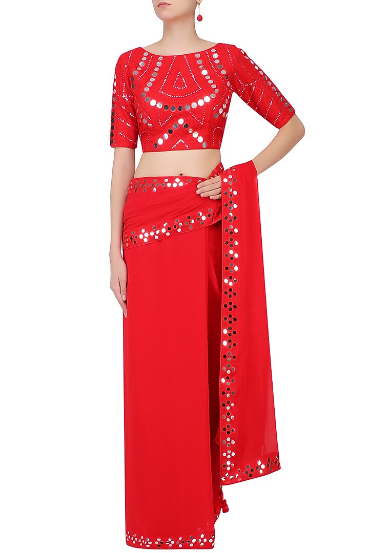 Red mirror work embellished saree with blouse available only at Pernia's Pop Up Shop.