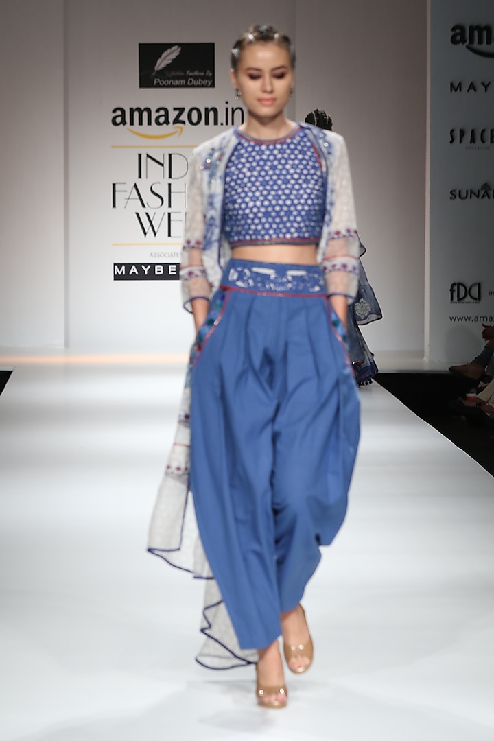 Indigo Block Printed Dhoti Pants with Crop Top and White Asymmetrical Cape by Poonam Dubey Designs