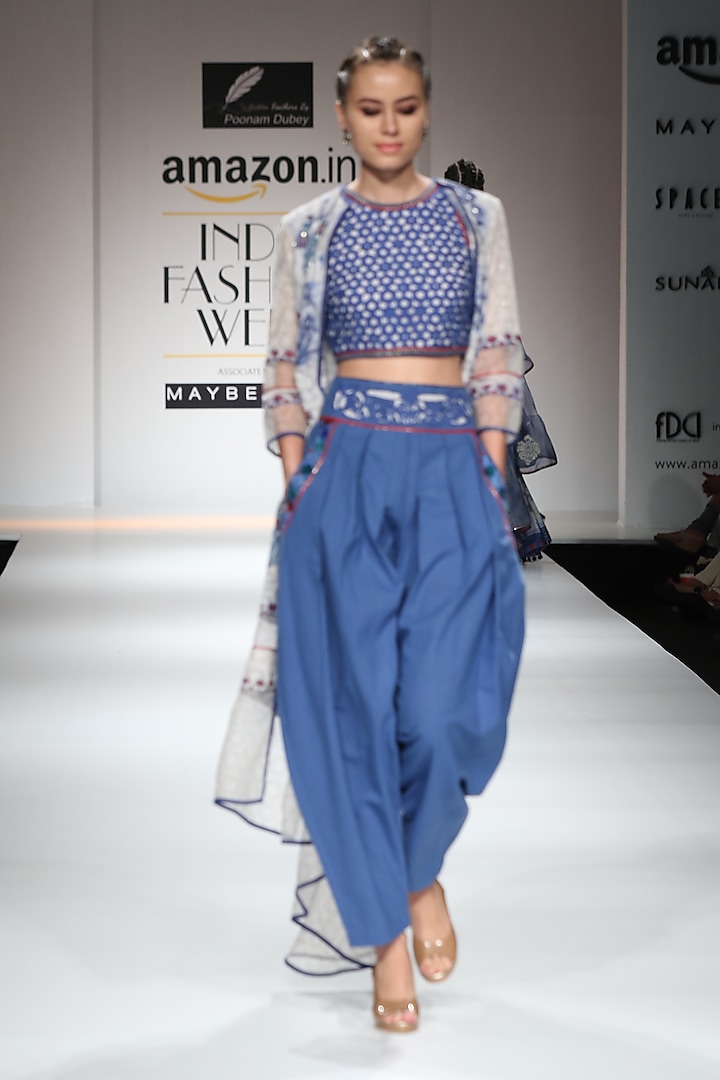 Indigo block printed dhoti pants with crop top and white asymmetrical cape available only at Pernia's Pop Up Shop.