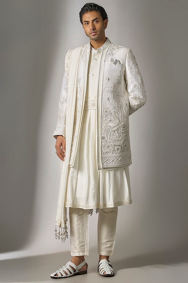 White Raw Silk Cutdana Embroidered Groom Sherwani Set by PARV DESIGN STUDIO at Pernia's Pop Up Shop